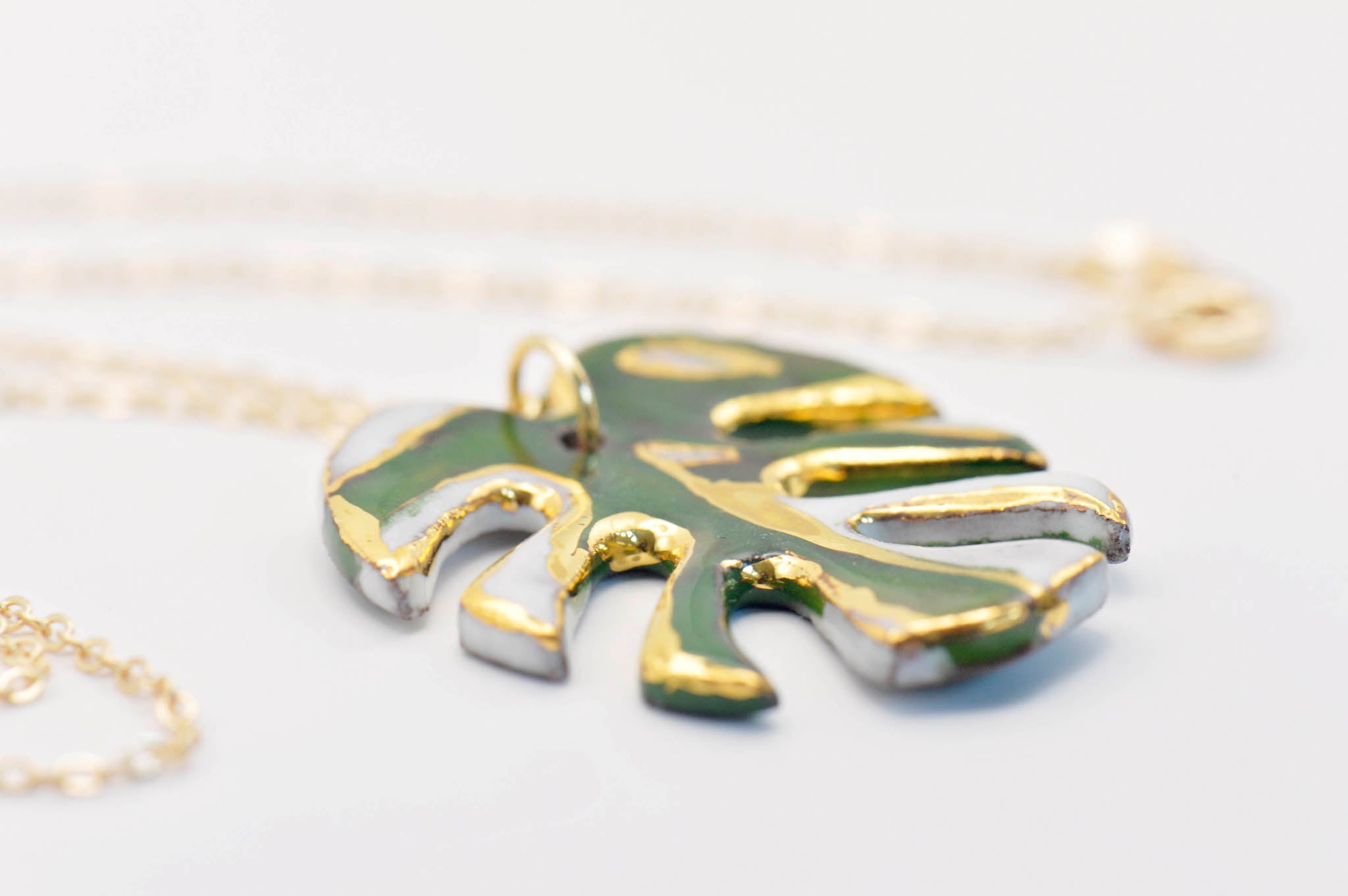Albo Variegata Monstera Ceramic Necklace with Gold Luster