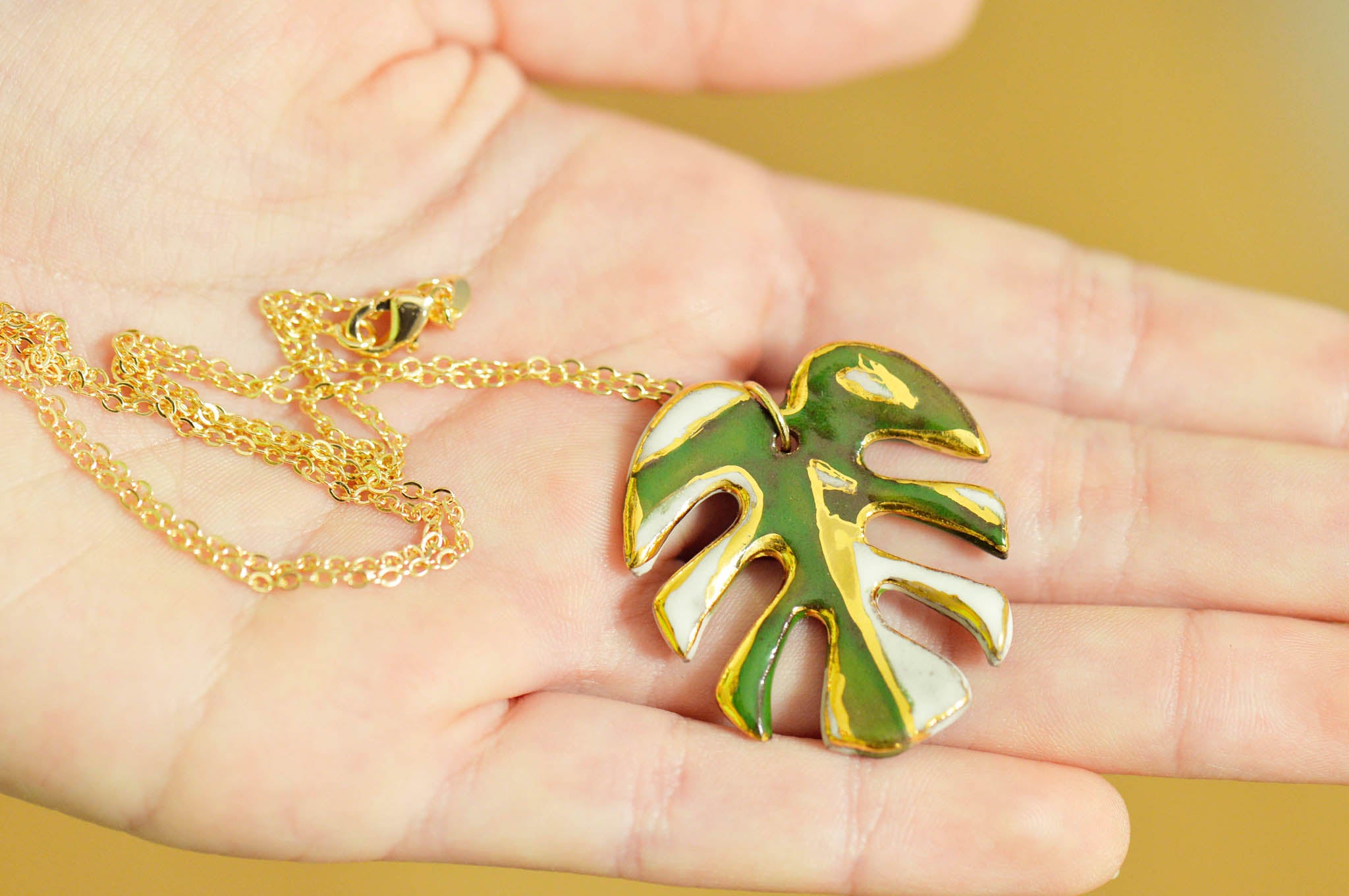 Albo Variegata Monstera Ceramic Necklace with Gold Luster